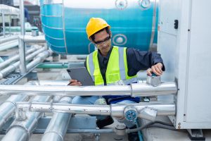 young-mechanical-contractor-working-on-rooftop